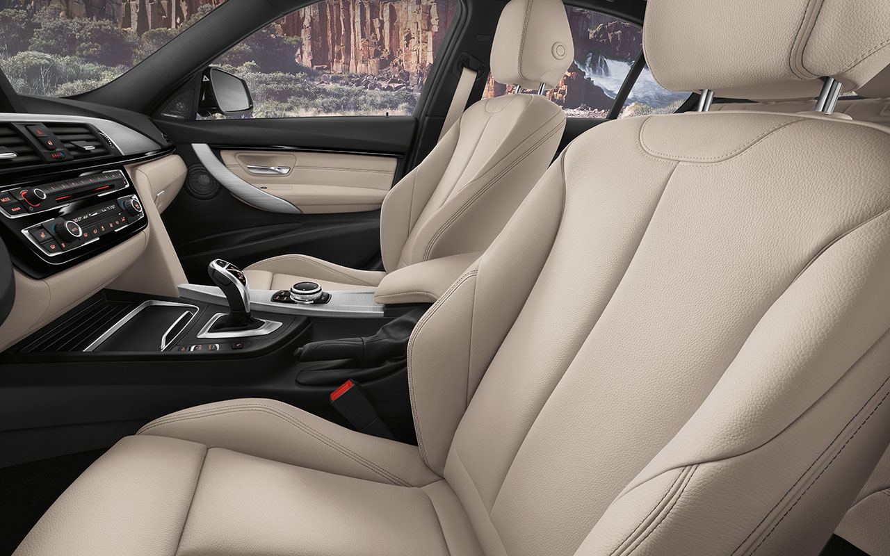 BMW 3 Series 320 i Xdrive Sedan interior front seat view